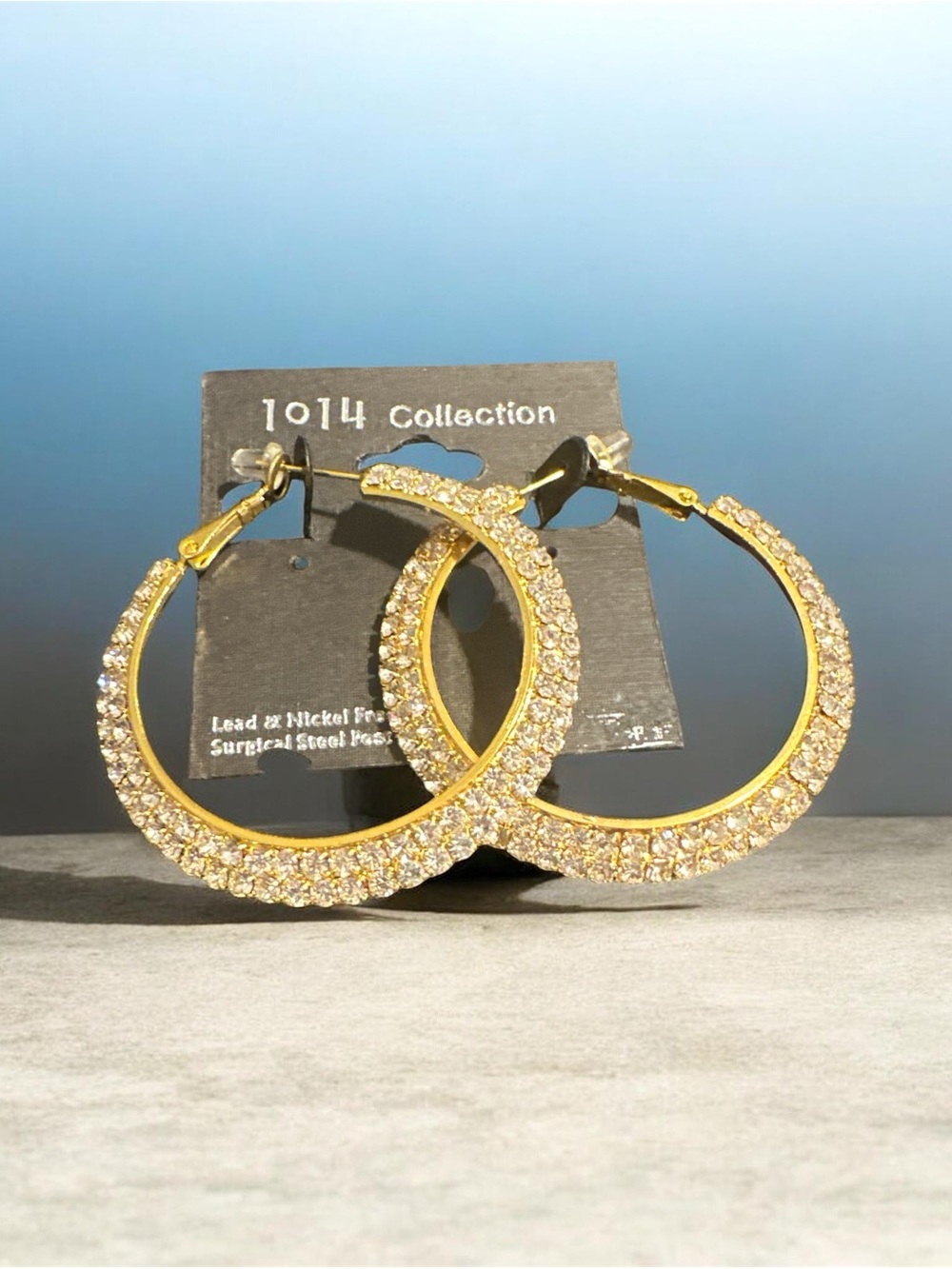 Gold Crystal Hoop Earrings
341